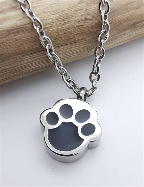 Precious Memorial: Paw Print Ashes Necklace for Your Beloved Pet
